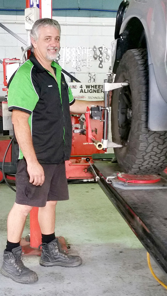 Andrew doing a Wheel Alignment